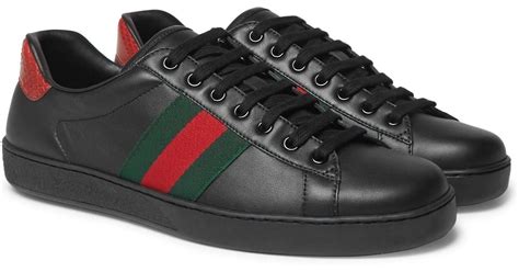 black gucci trainers|black Gucci ace sneakers.